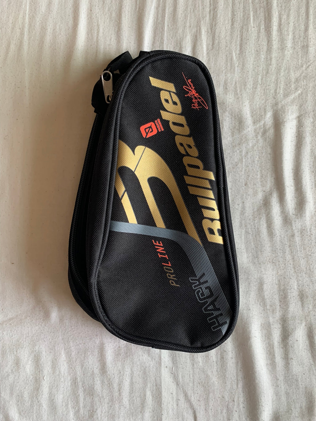 Funda de Pala Bullpadel Negra y Dorada