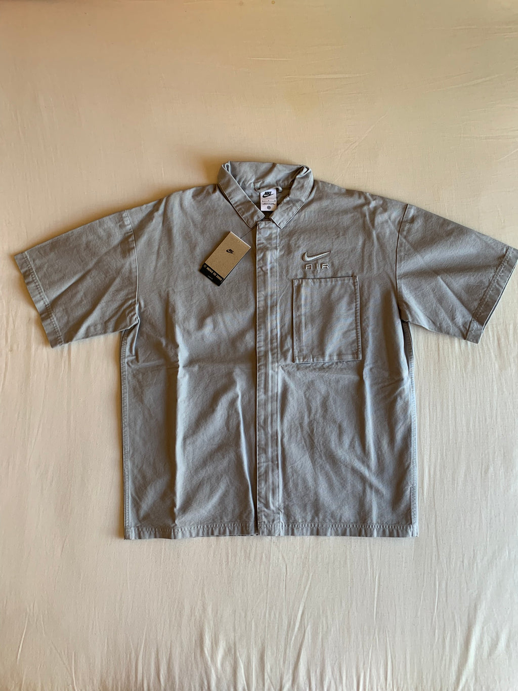 Camisa Nike Air Manga Corta Gris