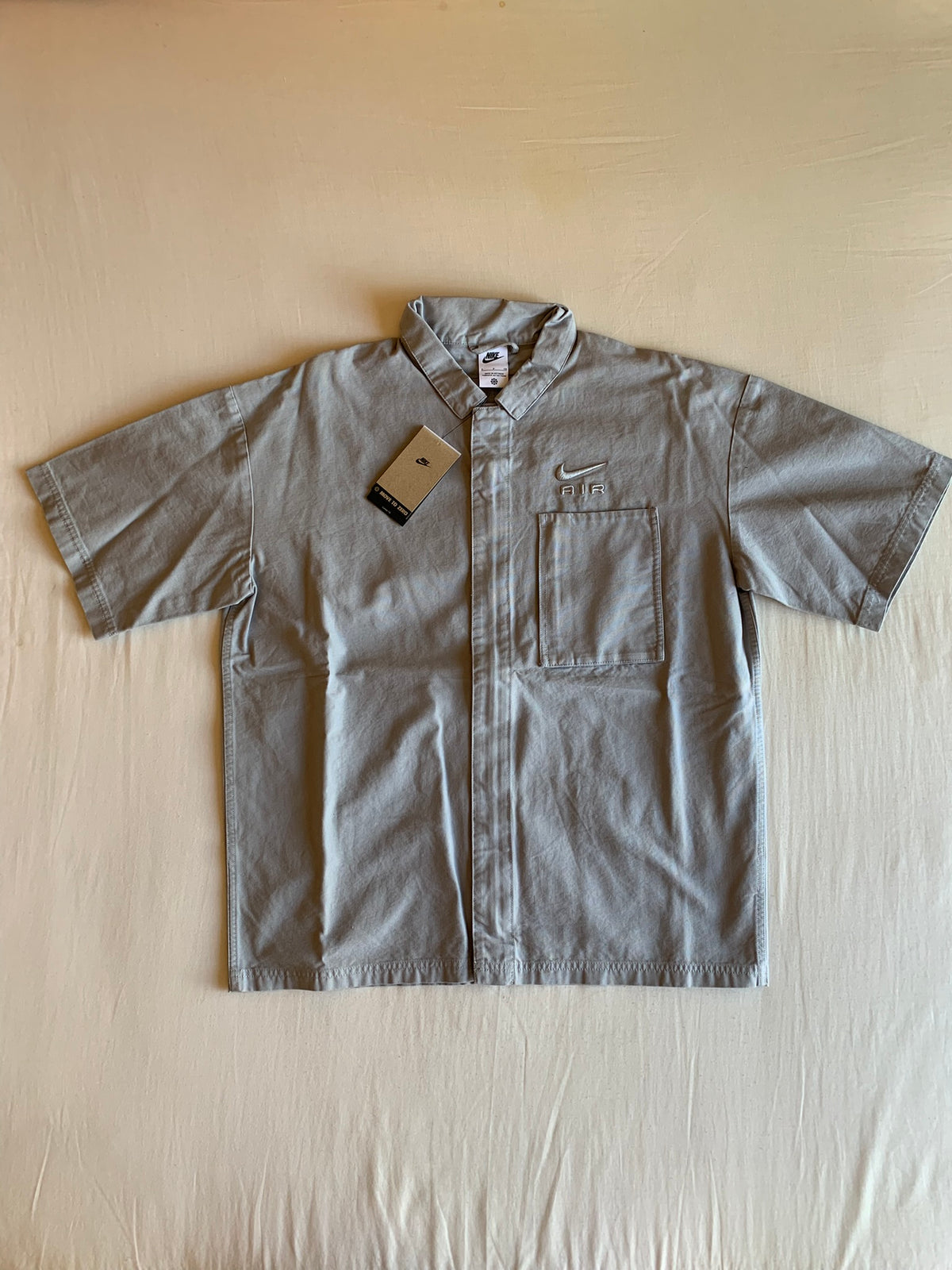 Camisa Nike Air Manga Corta Gris
