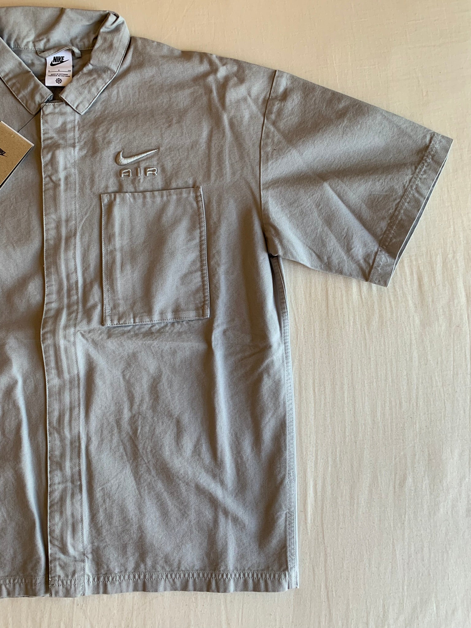 Camisa Nike Air Manga Corta Gris
