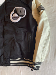 Chaqueta Varsity Zara Cross Wired Negra y Crudo