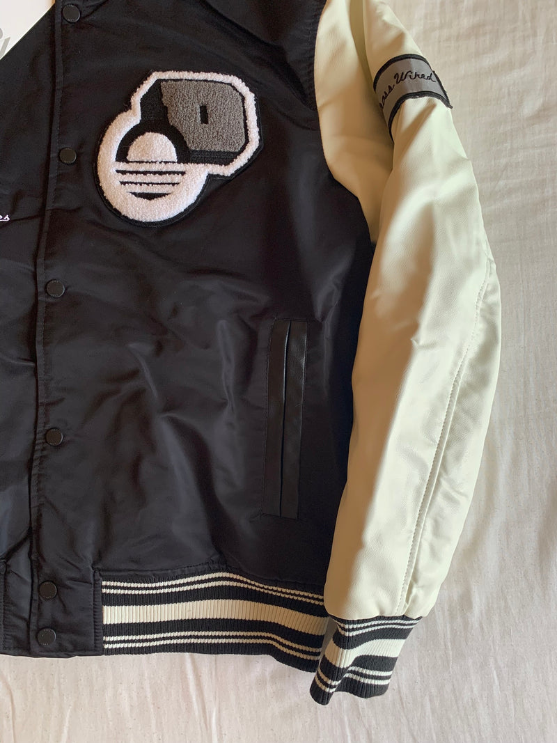 Chaqueta Varsity Cross Wired "Negra y Crudo"